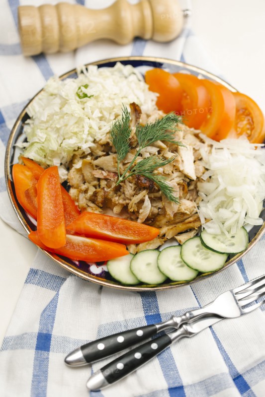 Garnish on meat and vegetable plate