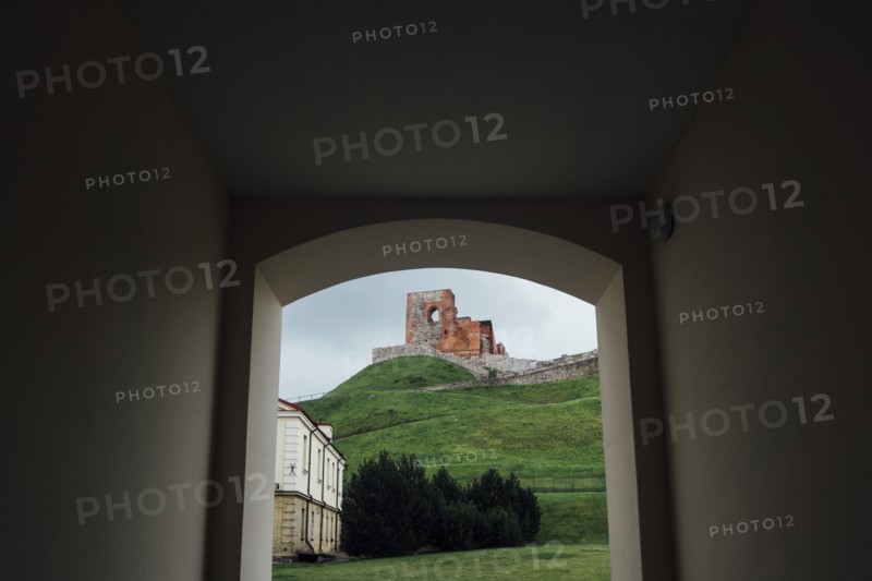 Scenic view of hill from arch
