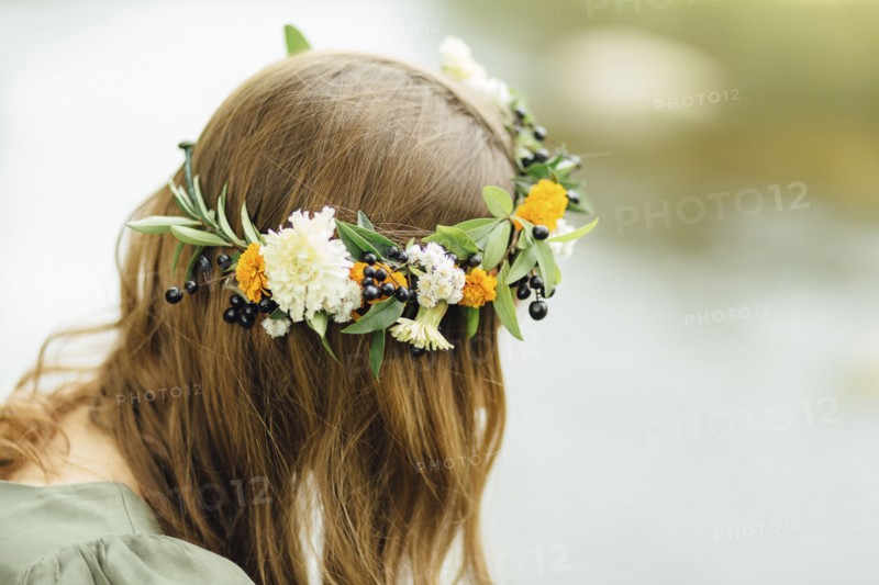 Close up of Middle Eastern woman wearing flower crown