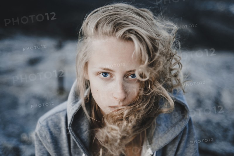Close up of wind blowing hair of Caucasian woman