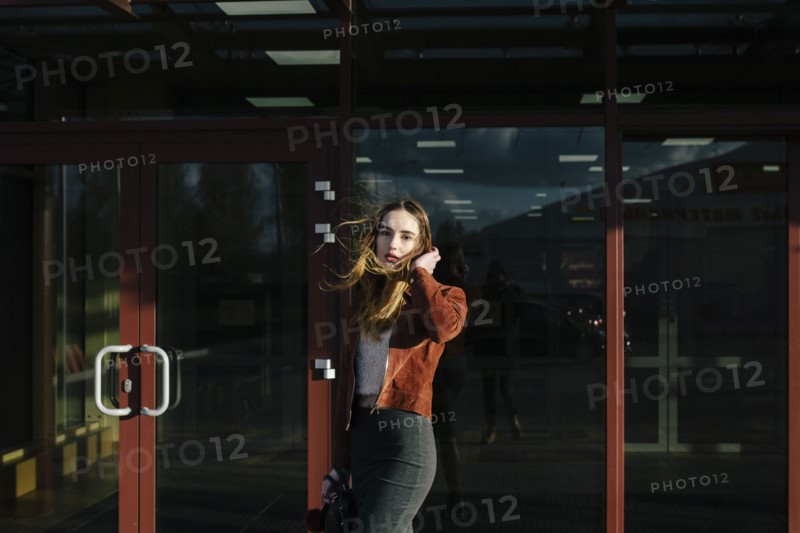 Wind blowing hair of Caucasian woman