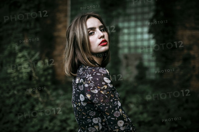 Portrait of a serious Caucasian woman outdoors