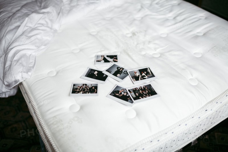 Photographs on bed mattress