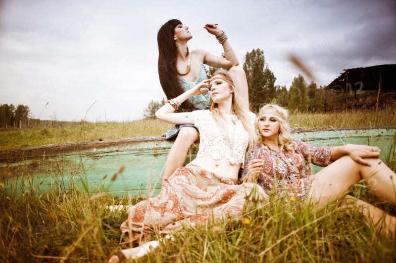 Caucasian women relaxing in field