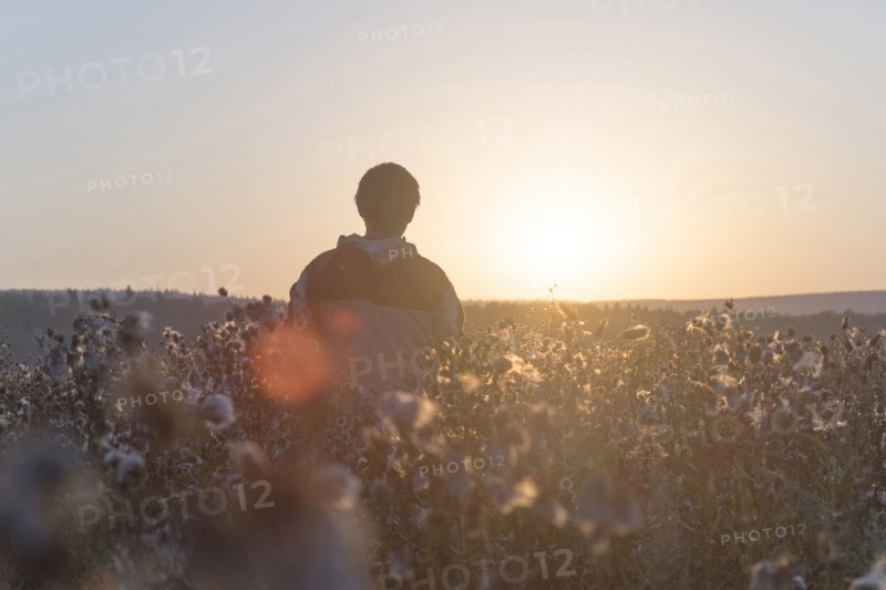 Mari man standing in field