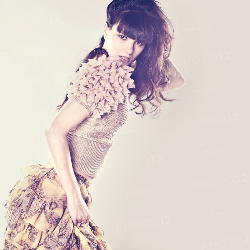 Caucasian woman wearing ruffled skirt