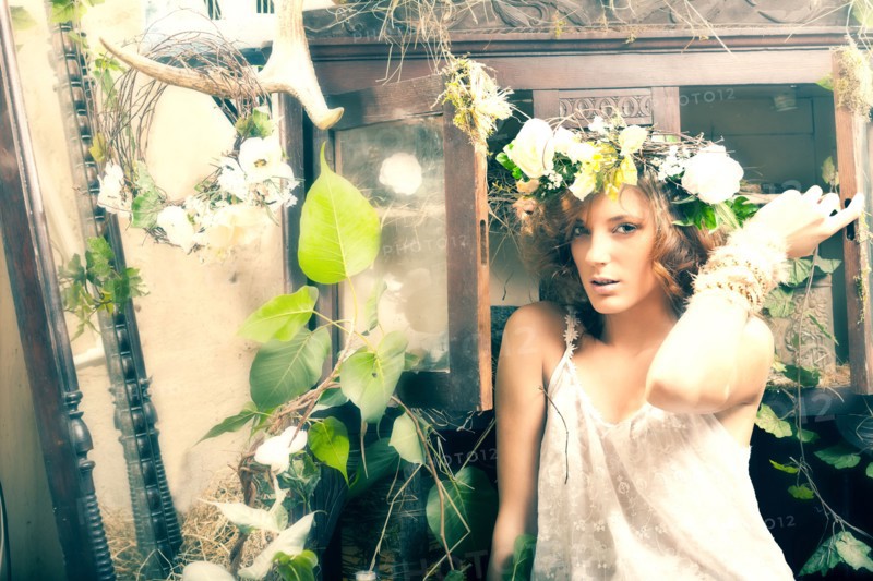 Portrait of serious Caucasian woman sitting in garden