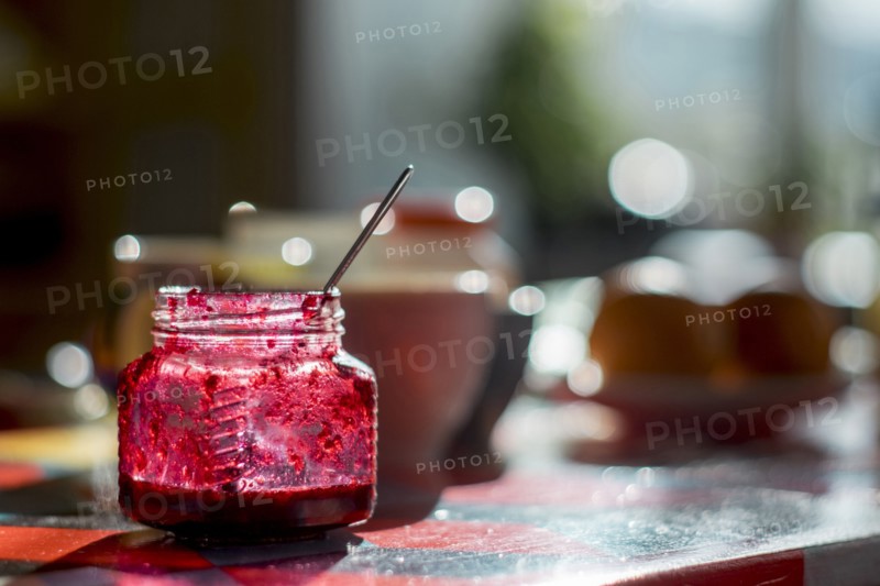 Spoon in jar of jam