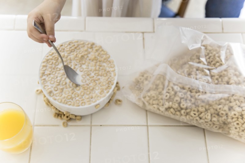 Girl eating bowl of cereal