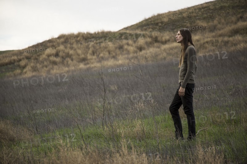 Man walking in rural field