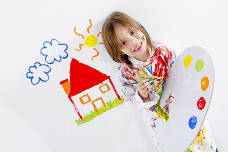 Hispanic girl painting