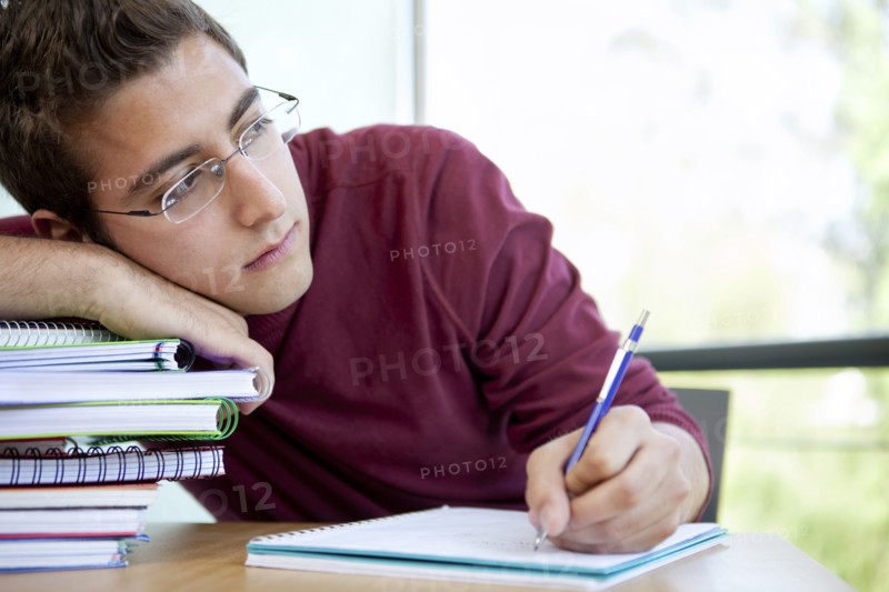 Hispanic college student doing homework