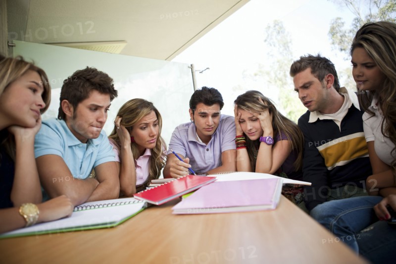 Hispanic college students doing homework