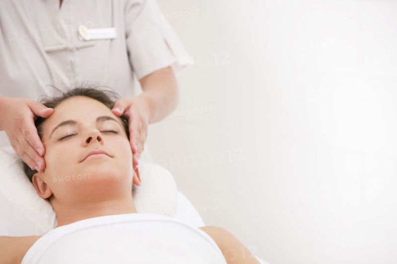 Woman having facial massage