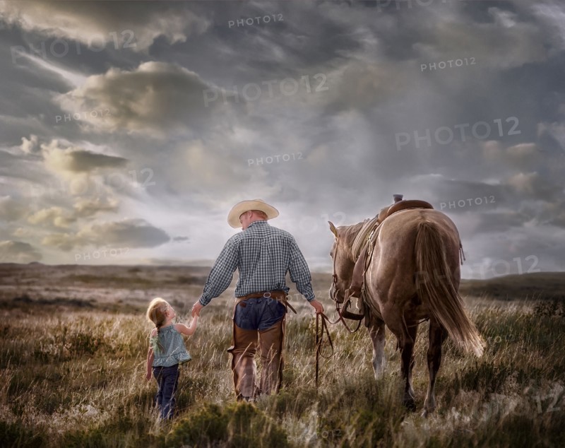 Caucasian father and daughter walking horse in field
