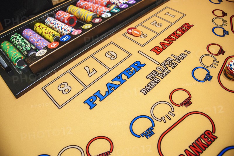 Gambling chips at baccarat table