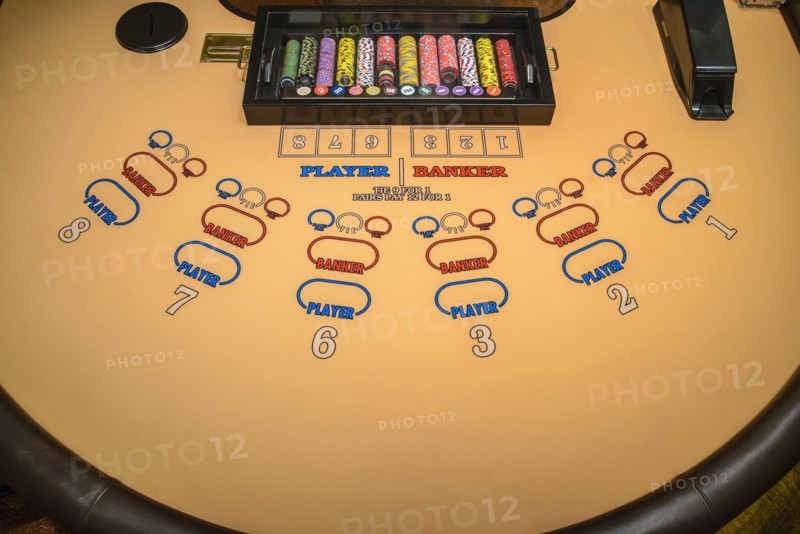 Gambling chips at baccarat table