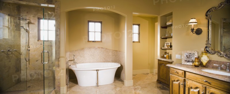 Contemporary master bath with glass shower and modern bathtub