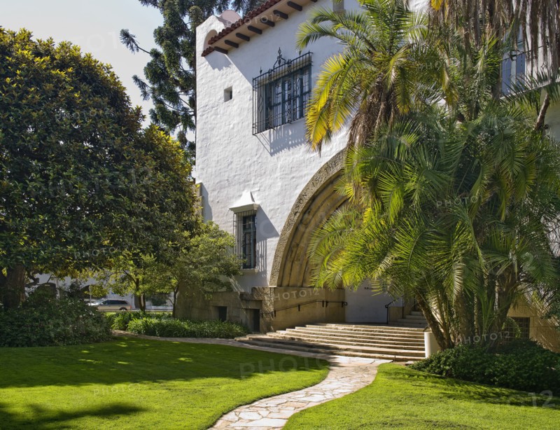 Stone walkway leading to arched entrance at Santa Barbara Courthouse