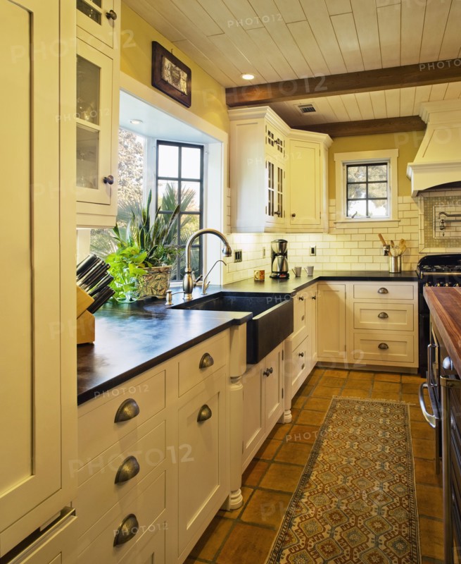 Contemporary kitchen in spanish style home