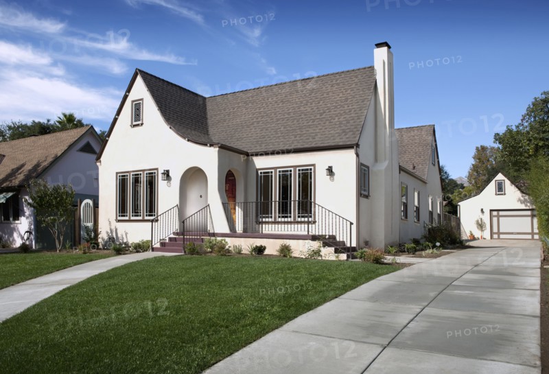 Exterior of cottage with lawn in front