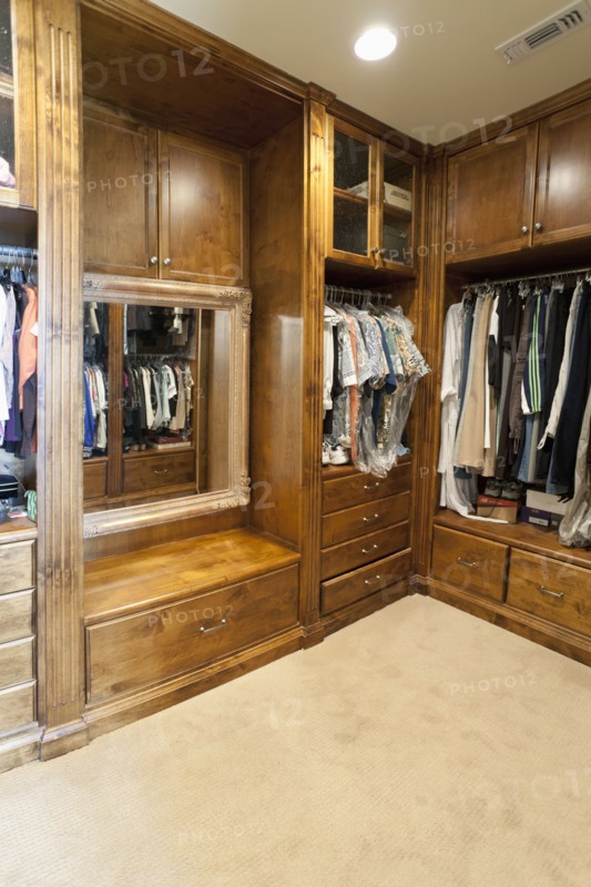 Large wooden walk in closet