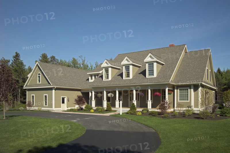 Curving driveway in front of single family home
