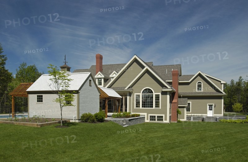 Exterior of a single family home against cloudy sky