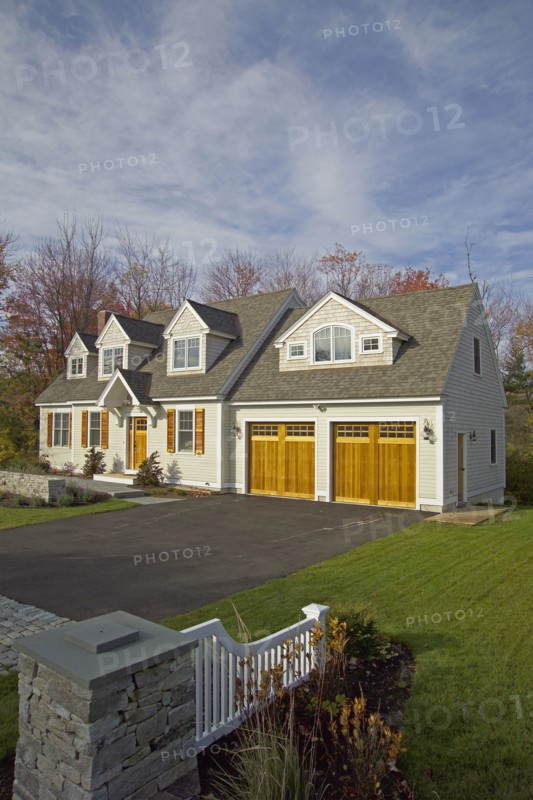 Driveway leading towards garage of single family home