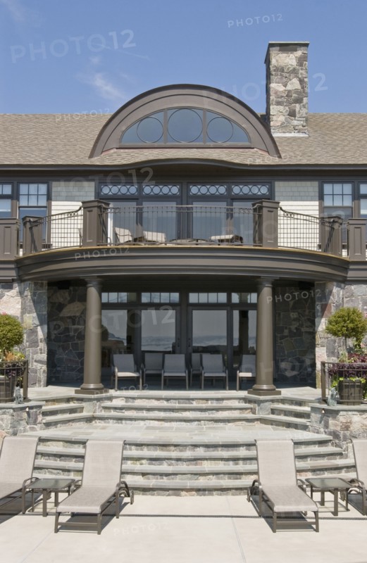 Contemporary back patio and balcony with patio furniture