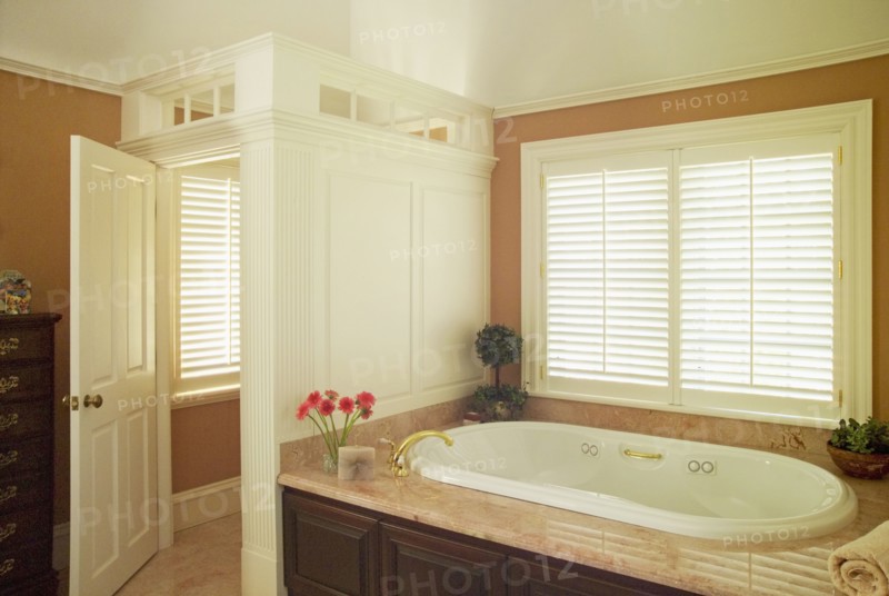 Detail traditional bathroom with marble around hot tub