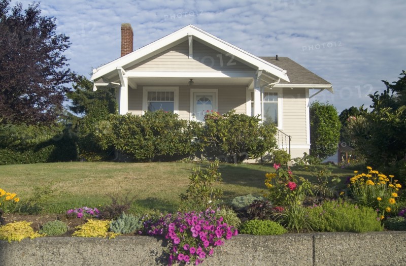 Exterior one story brown house with white trim at Bellingham