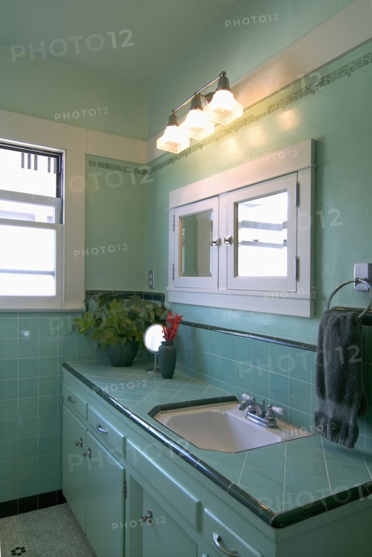 Interior shot of aquamarine bathroom