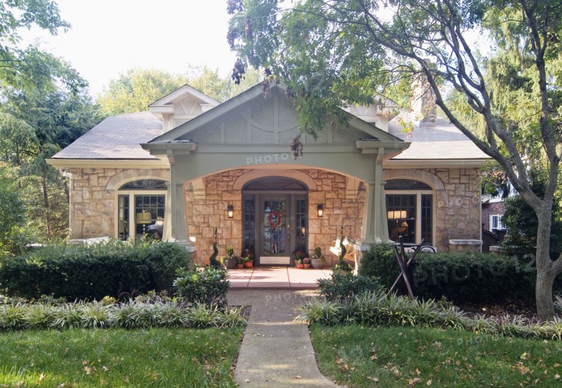Front exterior one story craftsman bungalow