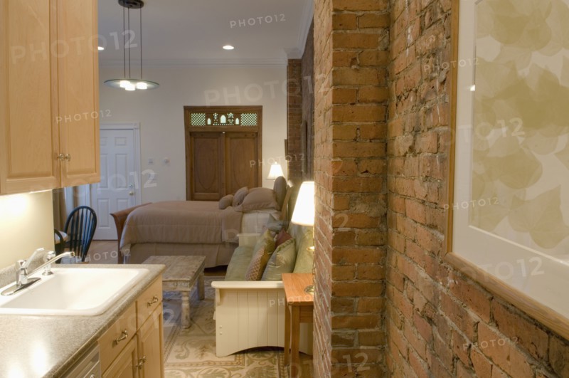 Brick wall in small studio apartment