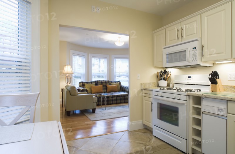 Traditional kitchen with doorway to living room