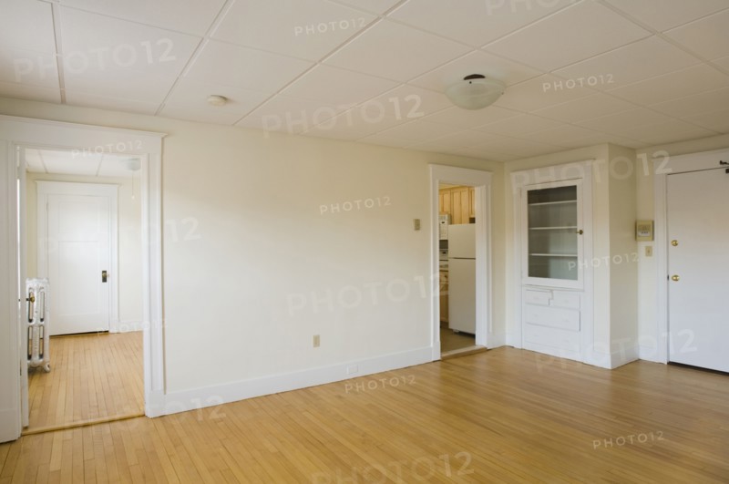 Empty room in apartment with hardwood floor