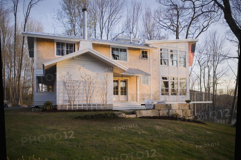 Contemporary multiple story shingle style home