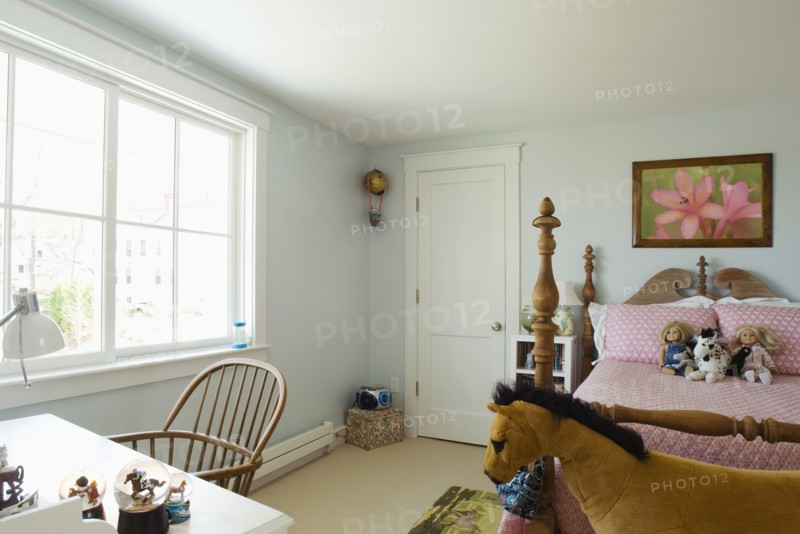 Girls bedroom with post bed