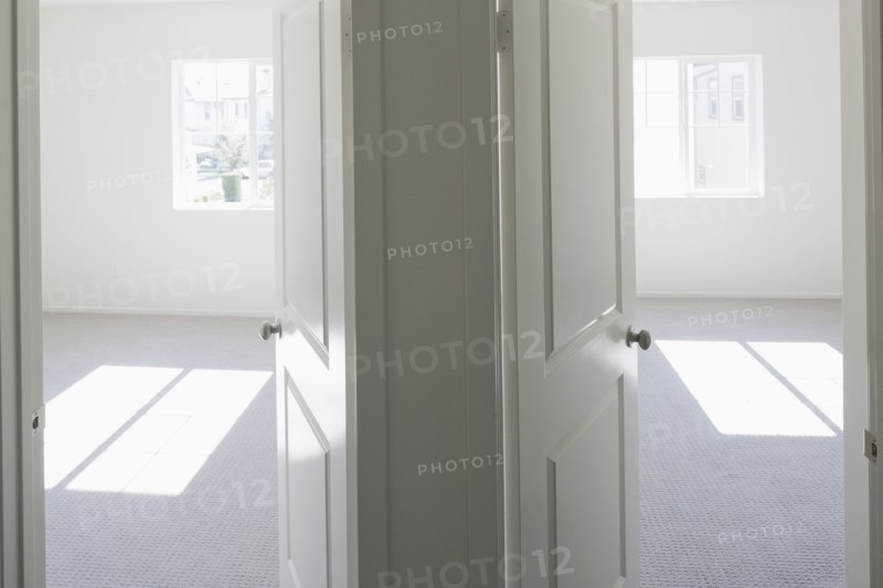 House with empty rooms and open doors