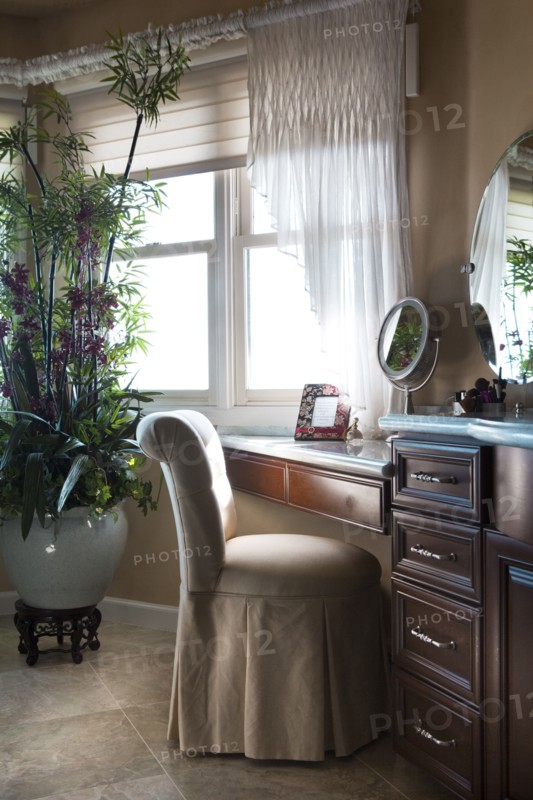 Chair at dressing table in bathroom at home