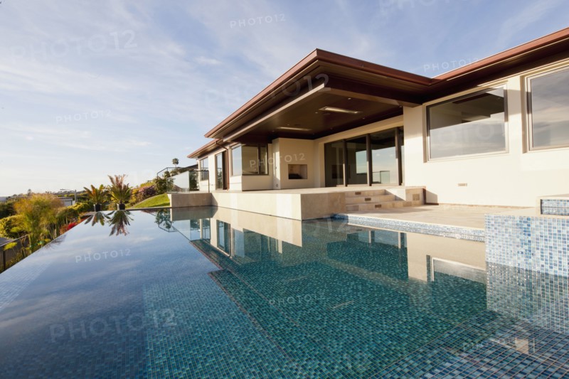 Swimming pool with luxury house against the sky at Laguna Niguel