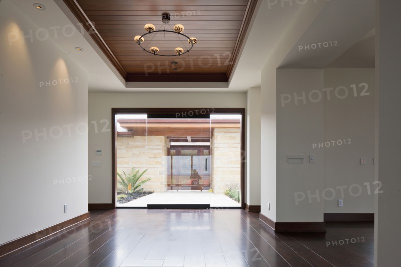 Empty large foyer with closed glass door