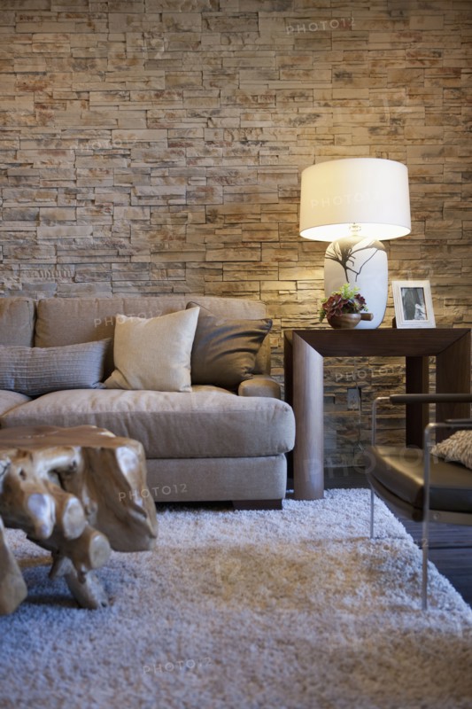 Sofa by end table in living room