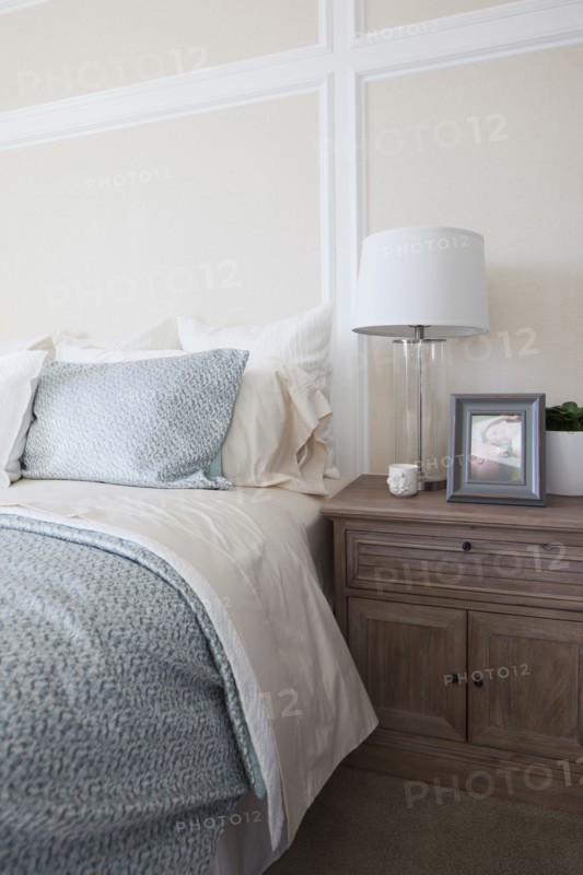 Night table by bed in middle class house