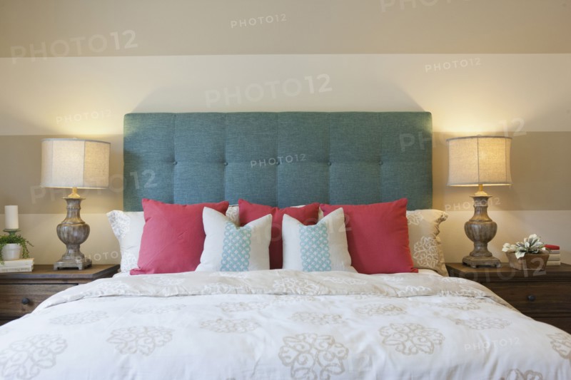 Interior of bedroom with night tables