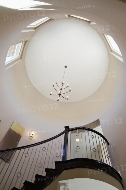 Low angle view of staircase and circular ceiling