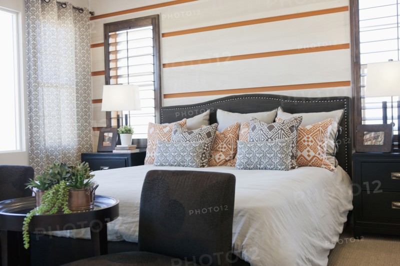 Pillows arranged on master bed