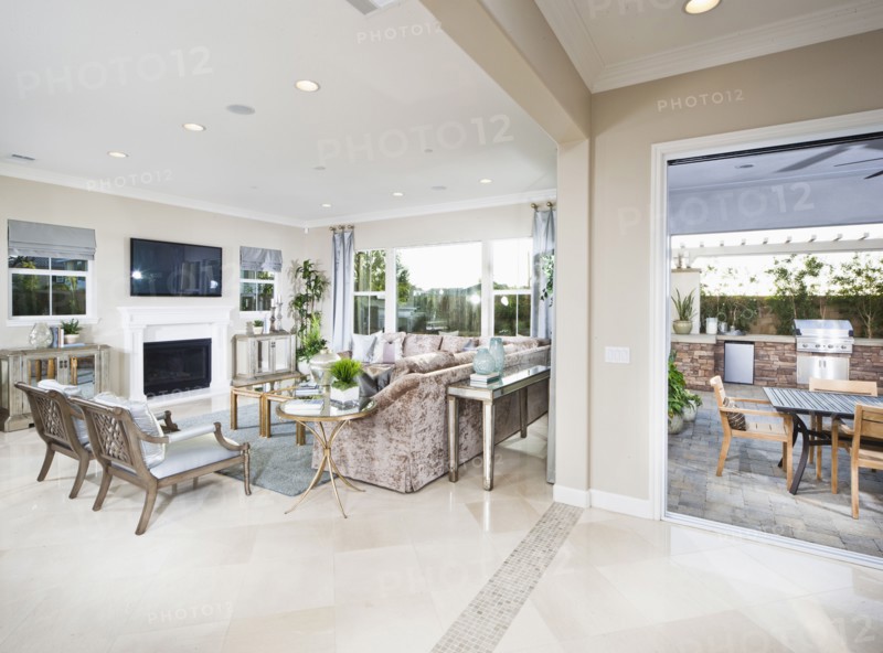 Spacious living room with view of dining area in the patio