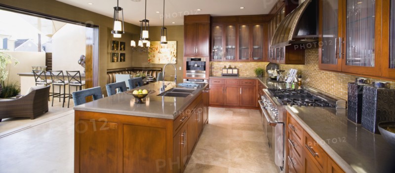 Contemporary kitchen with wall open to outside